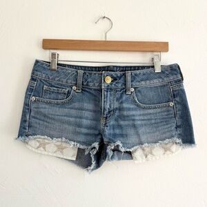 Y2K low rise denim glitter star pockets shorts by American Eagle